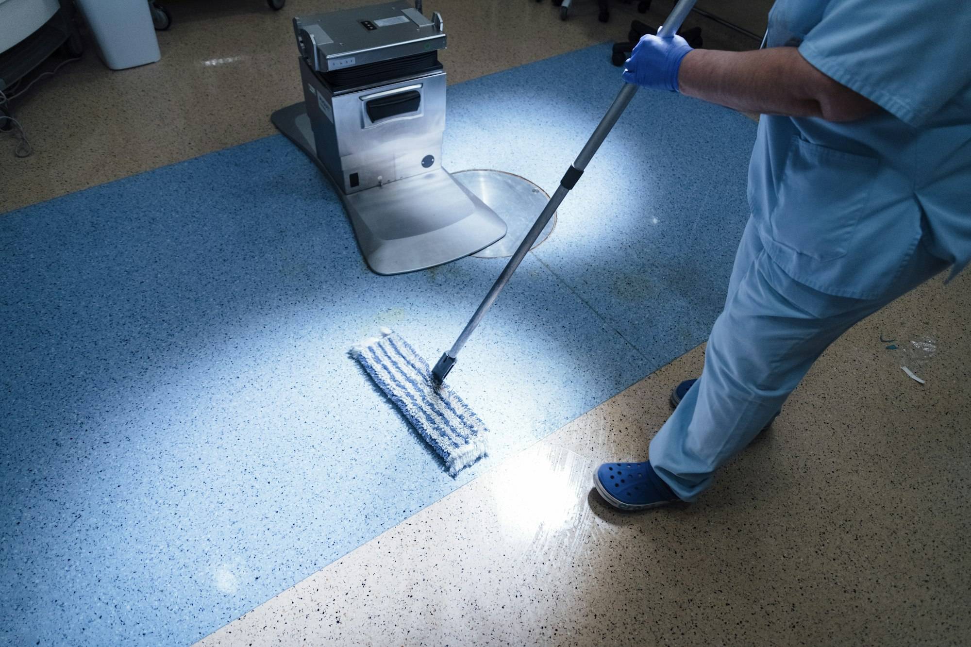 Concept photo of A hospital worker doing cleaning in operation room