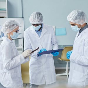 Scientists performing medical research in hospital laboratory