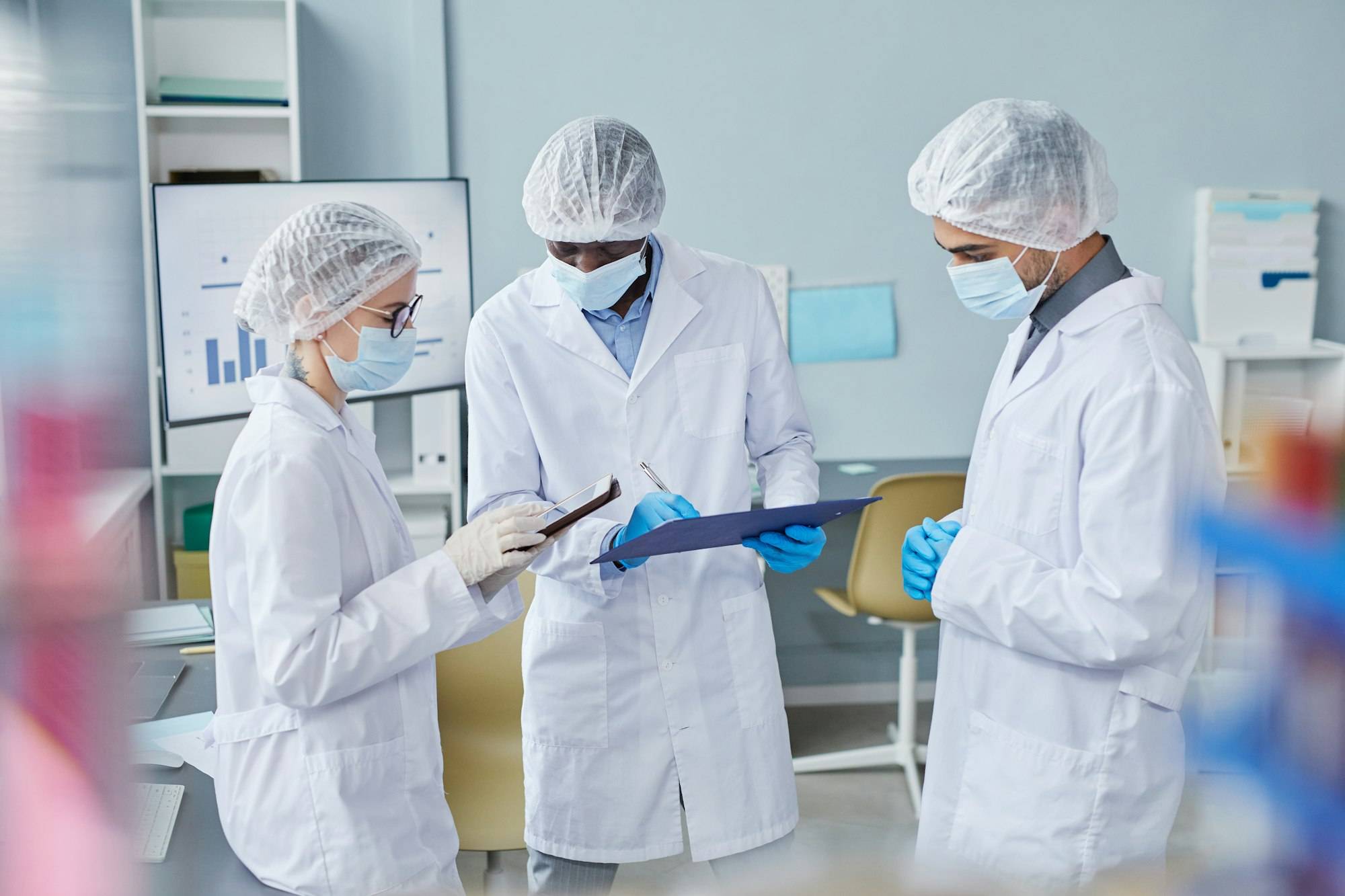 Scientists performing medical research in hospital laboratory